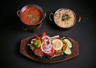 12.  Tandoori Mix Grill Sizzler /279,-   Forskjellige utvalg av tandoori retter med vanlig nan, ris, salat og saus Different choices of tandoori tikkas served with plain nan, rice, salad and saus *Lactose