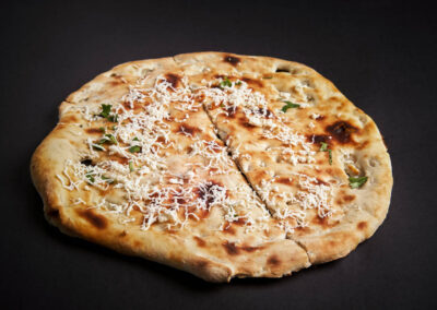 44.  Paneer Nan /59,-  Gjæret brød fylt med hjemmelaget ost, urter og krydder. Fermented bread filled with cottage cheese, herbs and spices. *Lactose, Eggs, Gluten