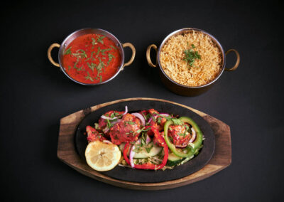 7.  Murg Tandoori Tikka /249,-  Benfri kylling marinert i yoghurt, sitronsaft og aromatiske krydder Boneless chicken marinated in yoghurt, lime, juice and aromatic spices. *Lactose