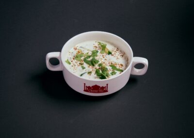 39.  Mix Raita /55,- Yoghurt tilsatt med hakket agurk, løk, tomater og lett krydret. Yoghurt with chopped cucumber, onions, tomatoes and spices. *Lactose