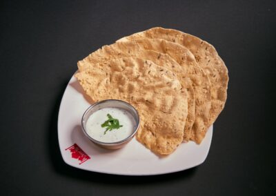 49. EXTRA POPPADUMSL BUKHARA /30,-